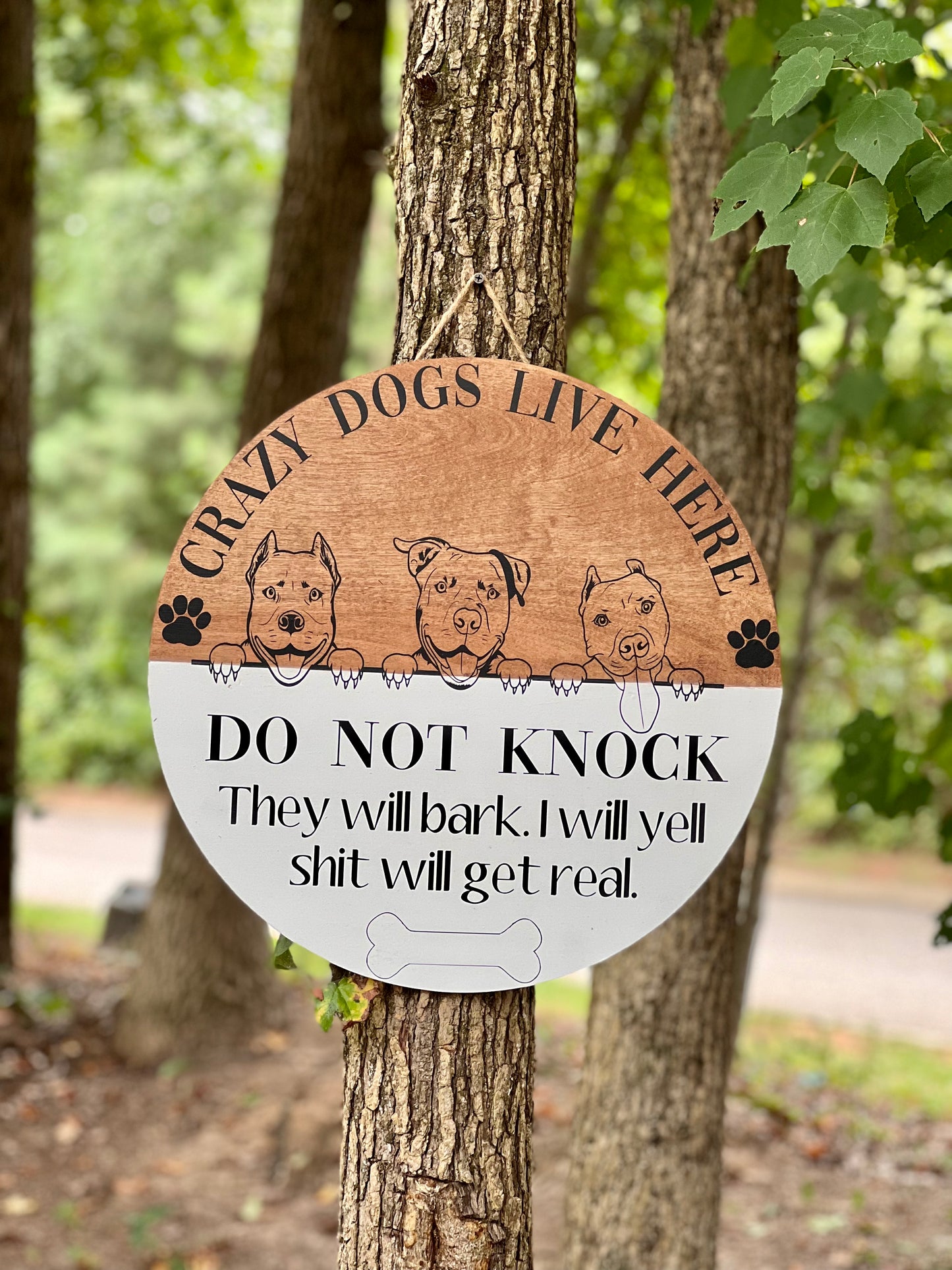 Crazy dogs live here do not knock shit will get real door hanger